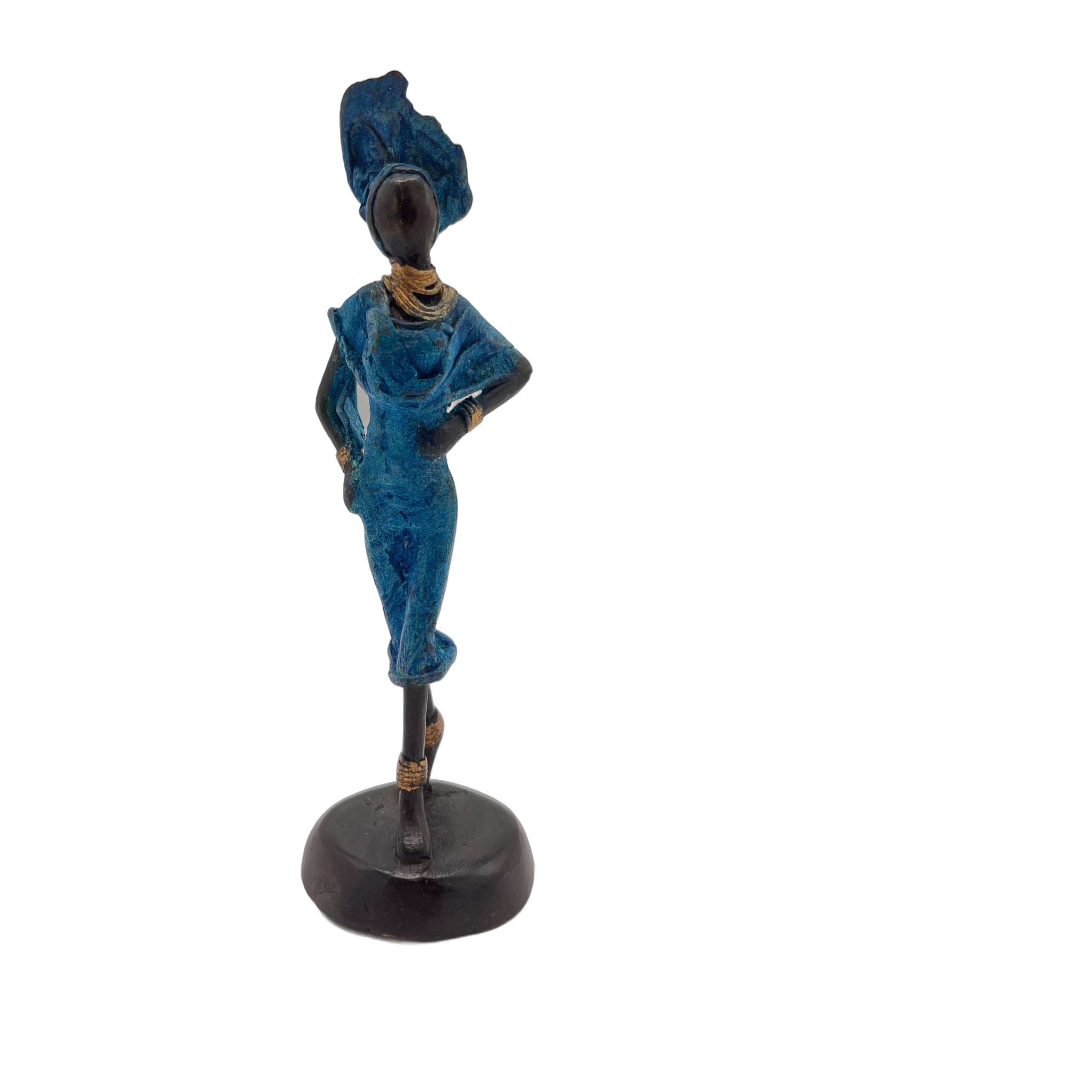African Blue Statue of Lady with Hand on Hip