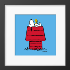 Snoopy lying on the roof of his red doghouse with Woodstock on his head against a light blue background, framed Peanuts print