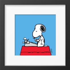 Snoopy typing on a grey typewriter on the roof of his red doghouse against a blue background, framed Peanuts print