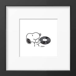 Snoopy holding a black vinyl record, framed black and white Peanuts print in a black frame