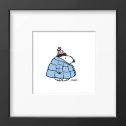 Snoopy in a thick light blue puffer coat with a pink beanie, framed Peanuts print in a black frame